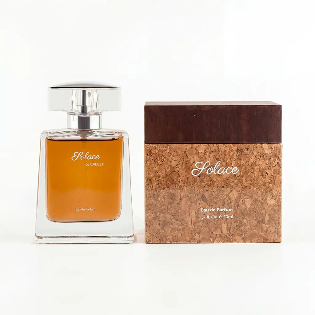Perfume bottle and packaging with 'Solace by CADLLY' branding on a white background