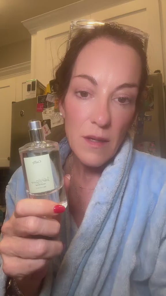 Bottle of Velvet Espresso perfume shown in customer review.

Velvet Espresso perfume and packaging displayed during product review.

Close-up of Velvet Espresso perfume bottle in customer testimonial.

Customer demonstrating Velvet Espresso perfume bottle and discussing scent.
